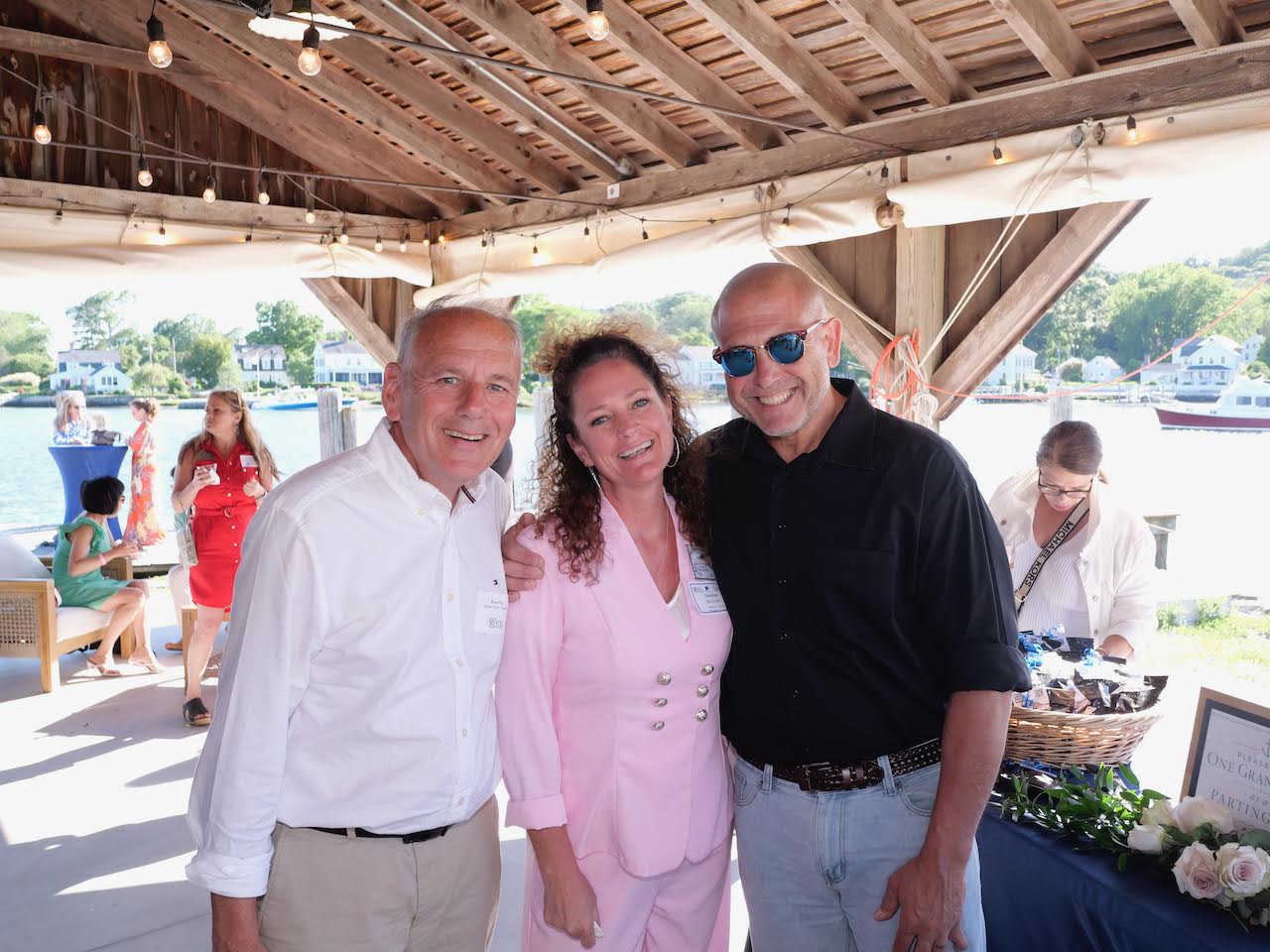 Lee Elci with supporters at a waterfront campaign event