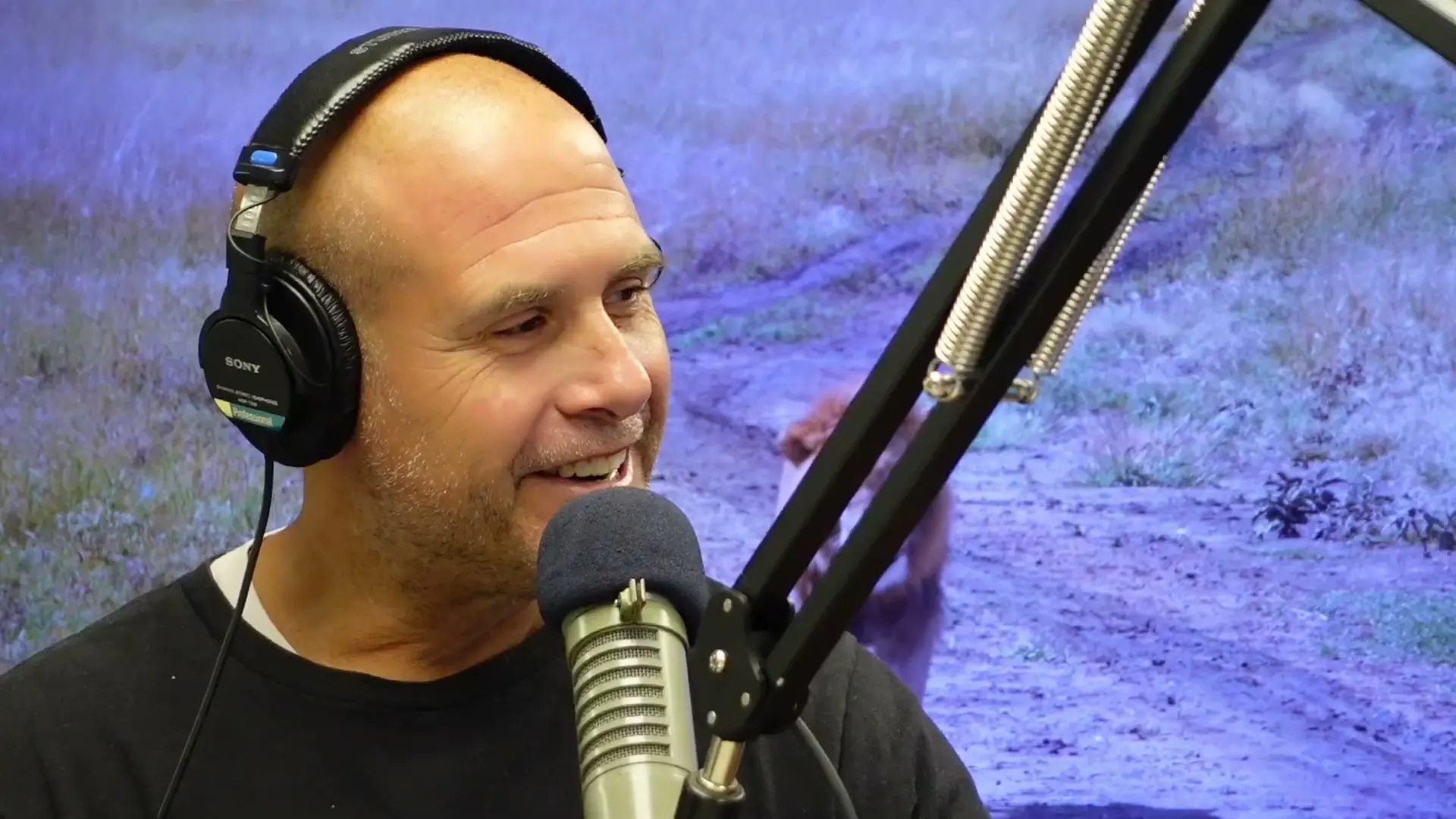 Lee Elci on the air behind the microphone